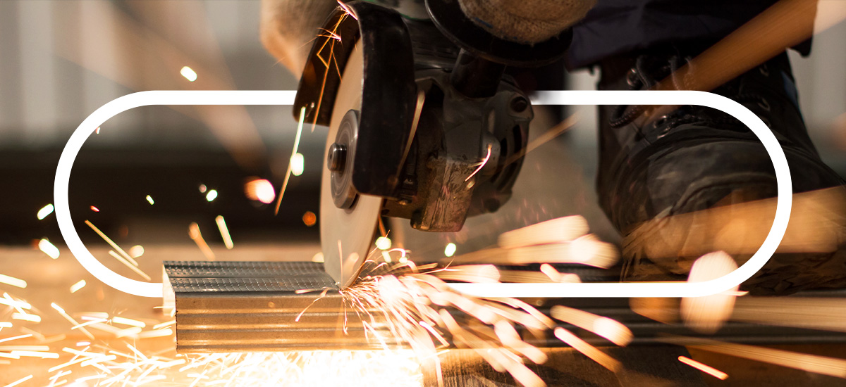 slitting machine cutting into material with sparks flying